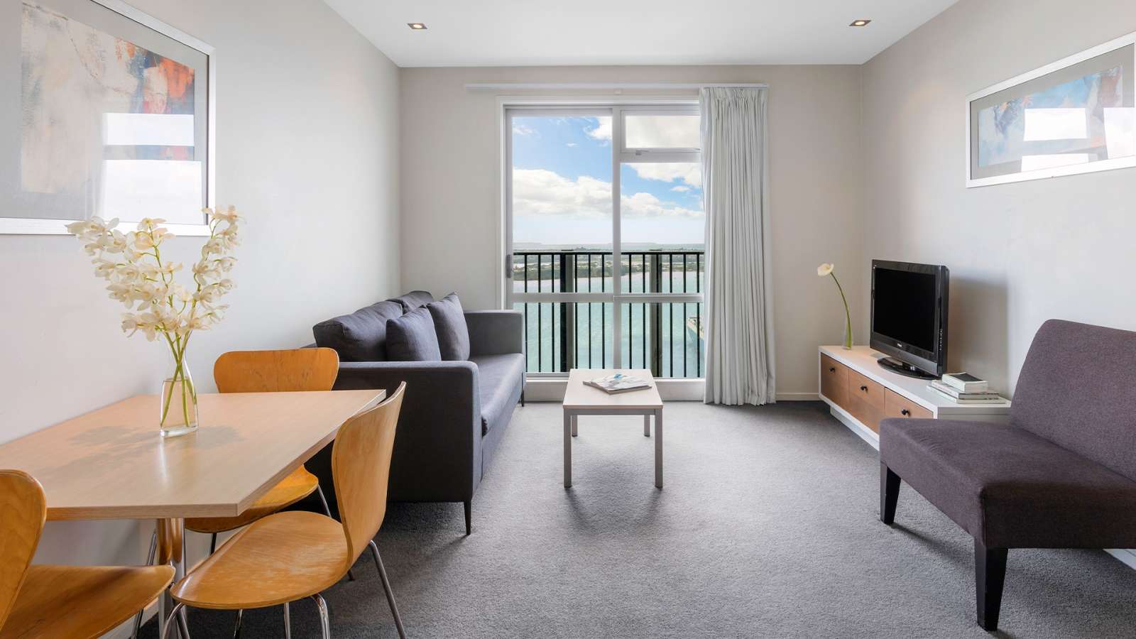 The living area of an apartment at Auckland Harbour Suites