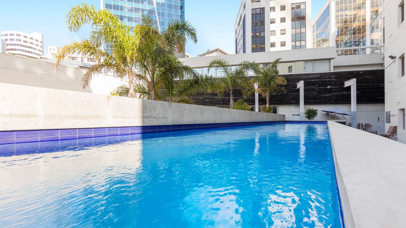 The outdoor pool at Auckland Harbour Suites